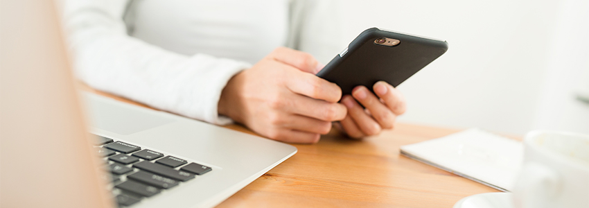 woman using phone and email